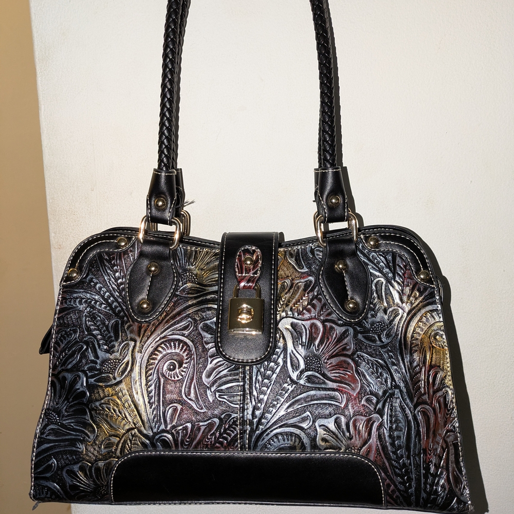 Elegant Black and Gold Embossed Handbag